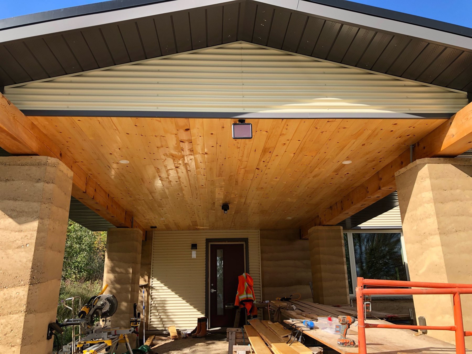 carport with pine ceiling
