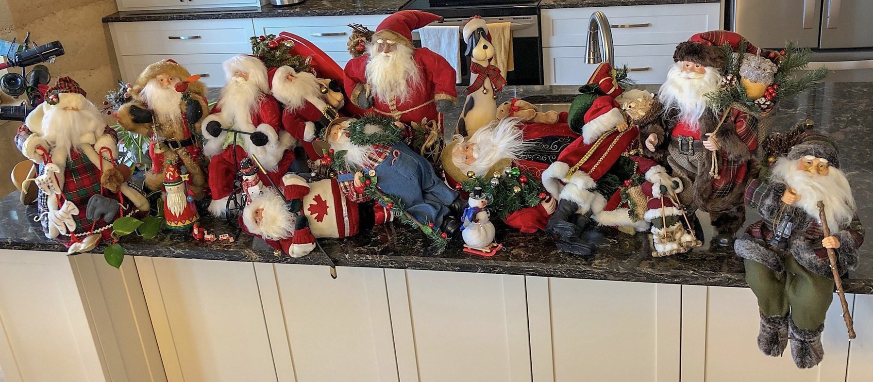 a group of little santas on the counter