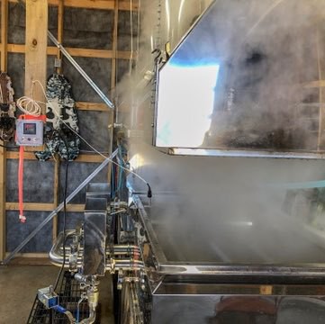 steam from a maple syrup evaporator