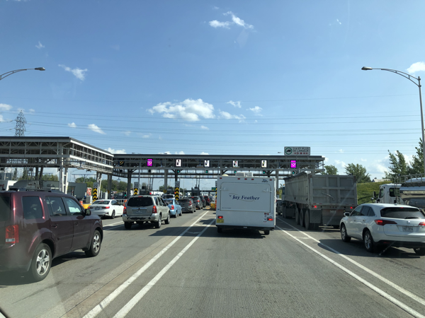 toll bridge with vehicles in several lanes
