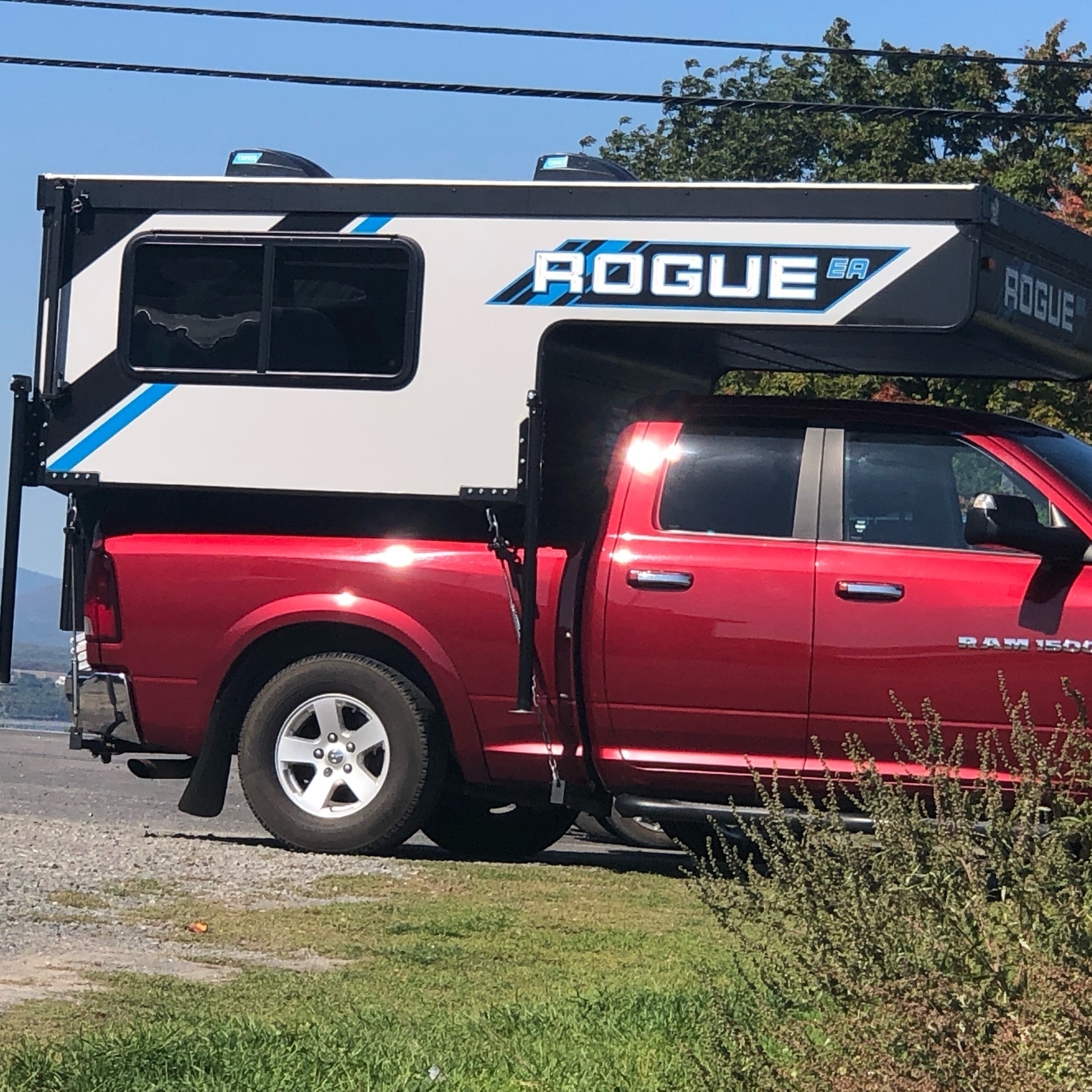 compact truck camper mounted on a truck