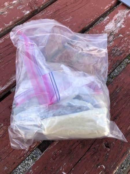 fish rolled up in a plastic bag